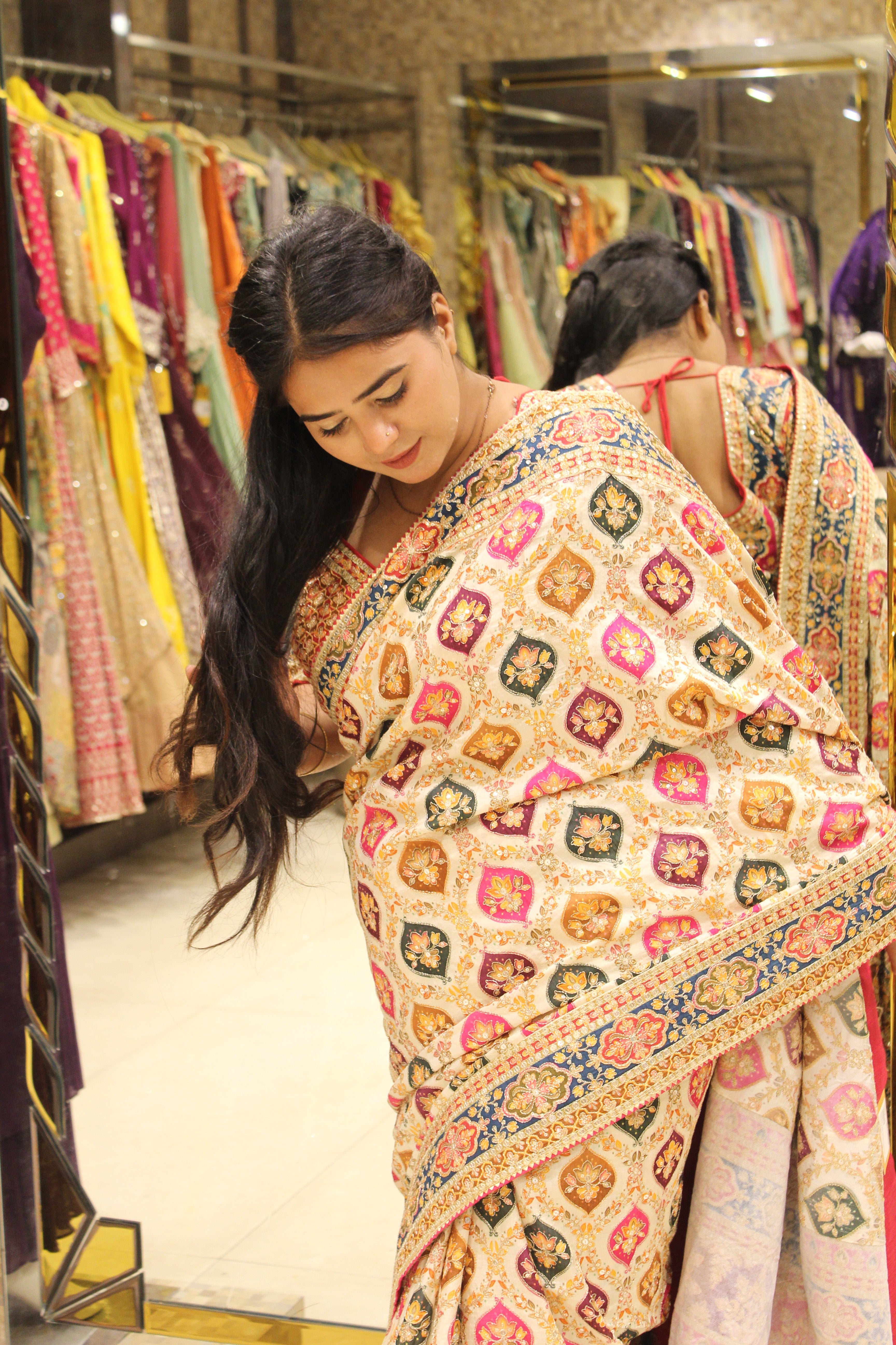 Cream Multicolored Geometric Motif Saree with Decorative Border