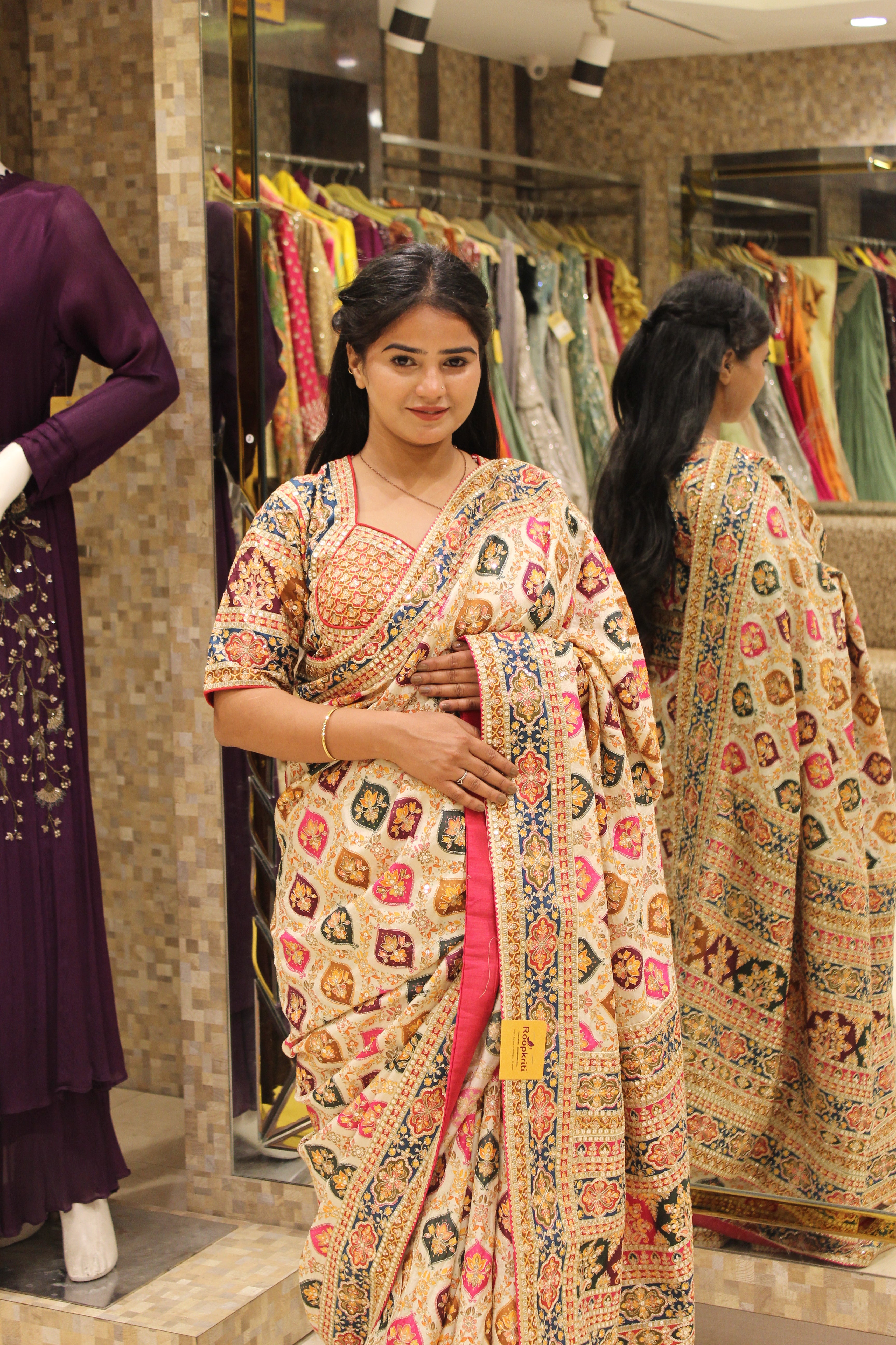 Cream Multicolored Geometric Motif Saree with Decorative Border