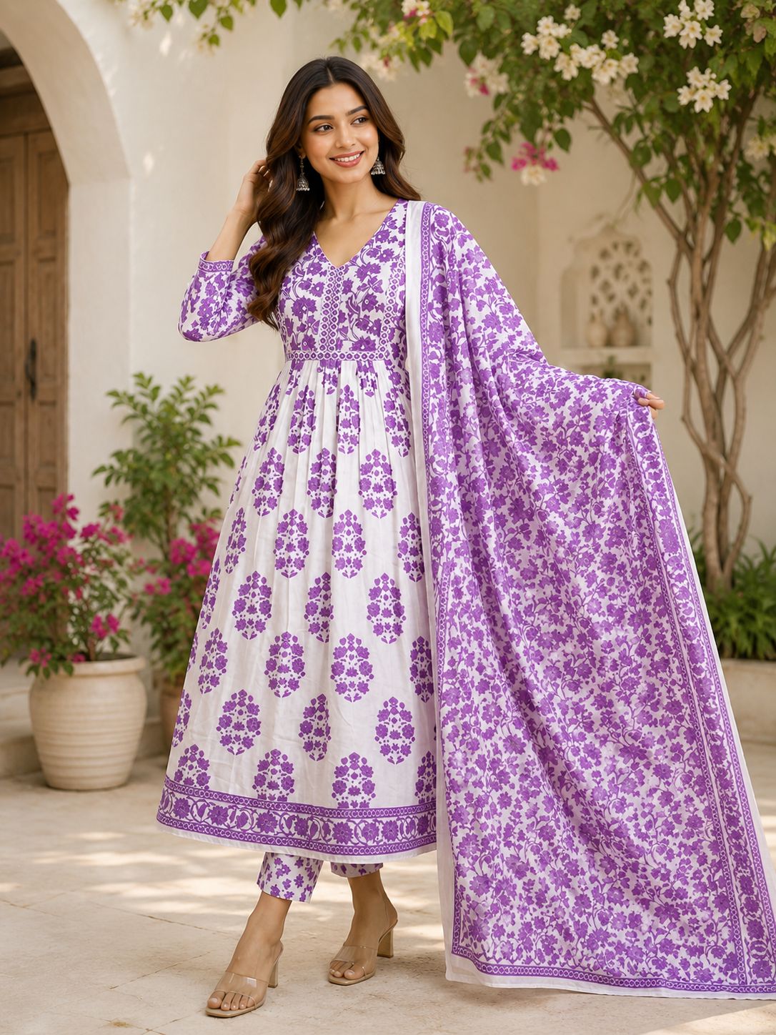 Fresh floral cotton suit set with matching dupatta. Perfect for everyday elegance.